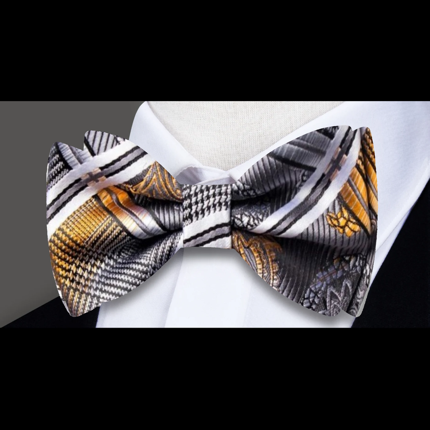 A Silver, Black, Orange Geometric and Paisley Pattern Silk Self Tie Bow Tie