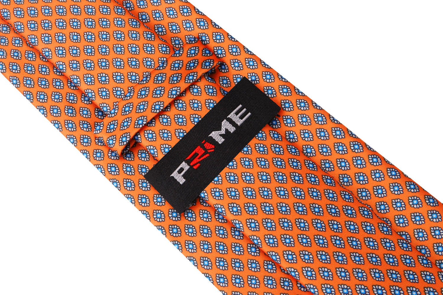 Tie Keep View: A Necktie that is sunfire coral with a small medallion pattern 