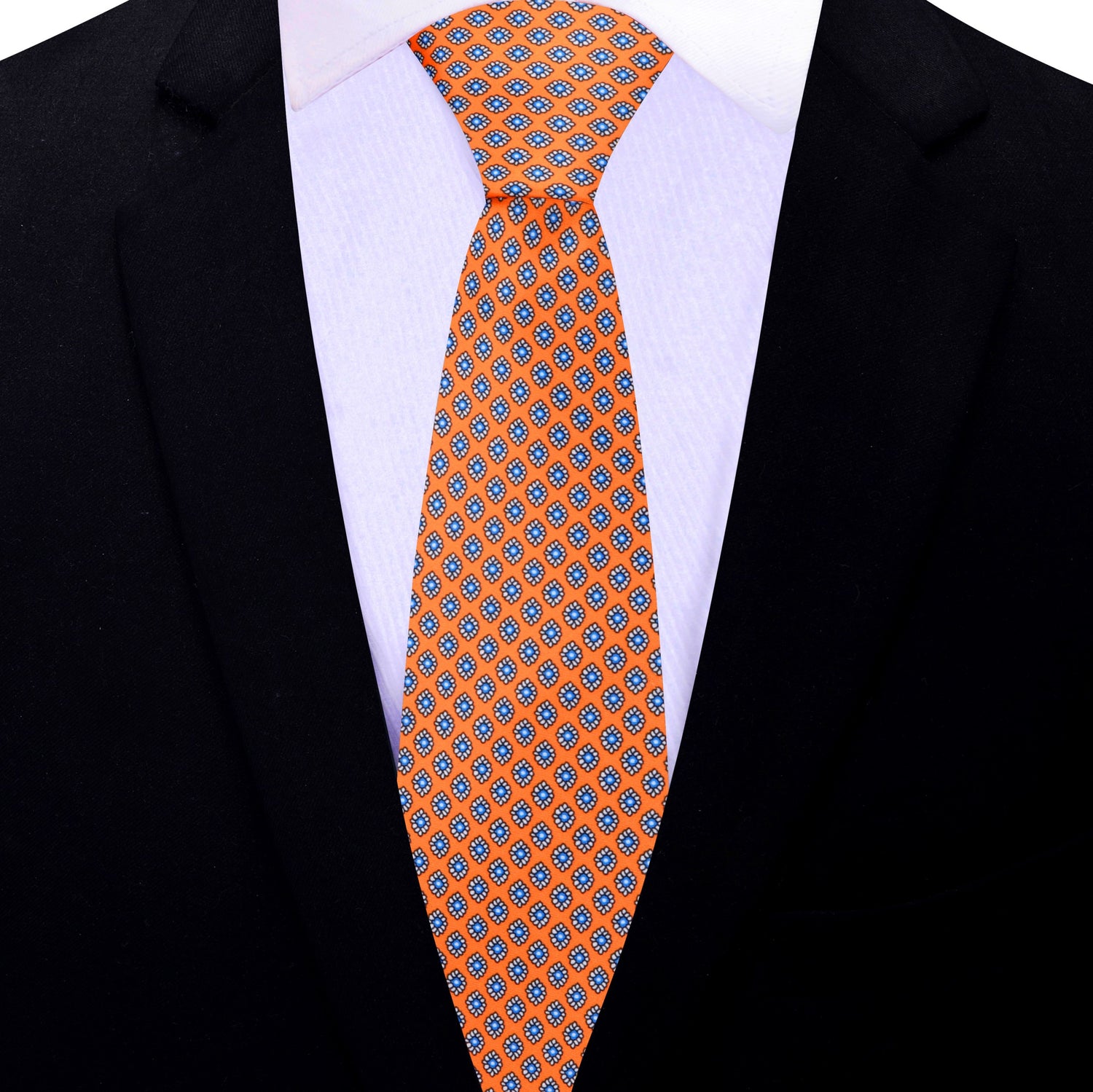 Thin Tie: A Necktie that is sunfire coral with a small medallion pattern