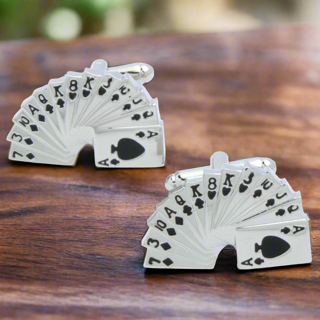 a small pair of playing cards cufflinks