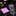 A purple silk necktie with a detailed paisley pattern and a matching solid purple pocket square, displayed on a black marble table in a luxury retail setting.