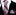Striped plum black and white tie and pocket square set on a black suit background