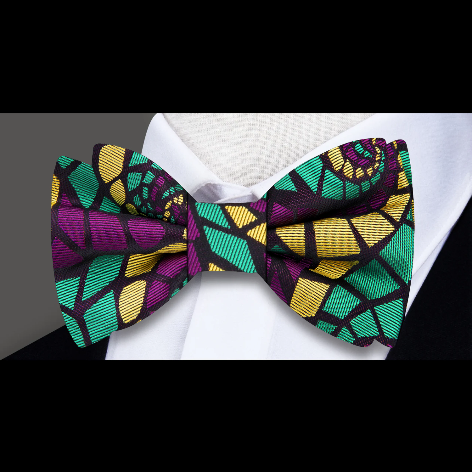 Green, purple, yellow abstract bow tie  
