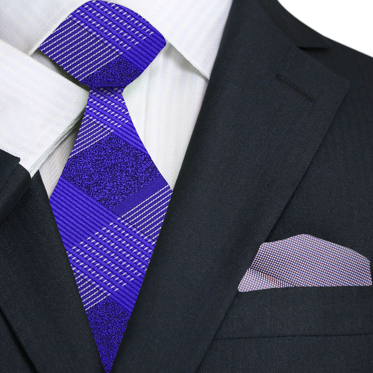 Black suit with a white shirt, purple tie, and grey pocket square.