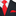 Black suit with a red patterned tie and pocket square on a white background