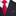 Red patterned tie and matching pocket square on a black suit jacket.
