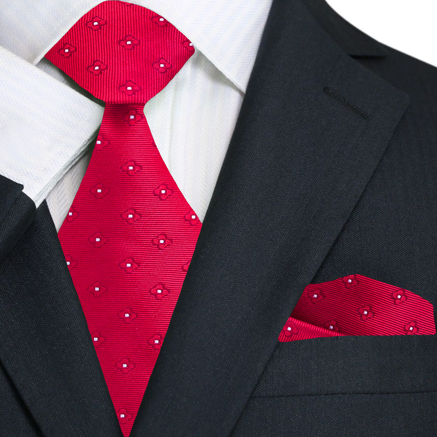 Red patterned tie and matching pocket square with a black suit jacket.