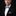 Green and Red Christmas Candy Bow Tie and Accenting Floral Square on Man with Suit