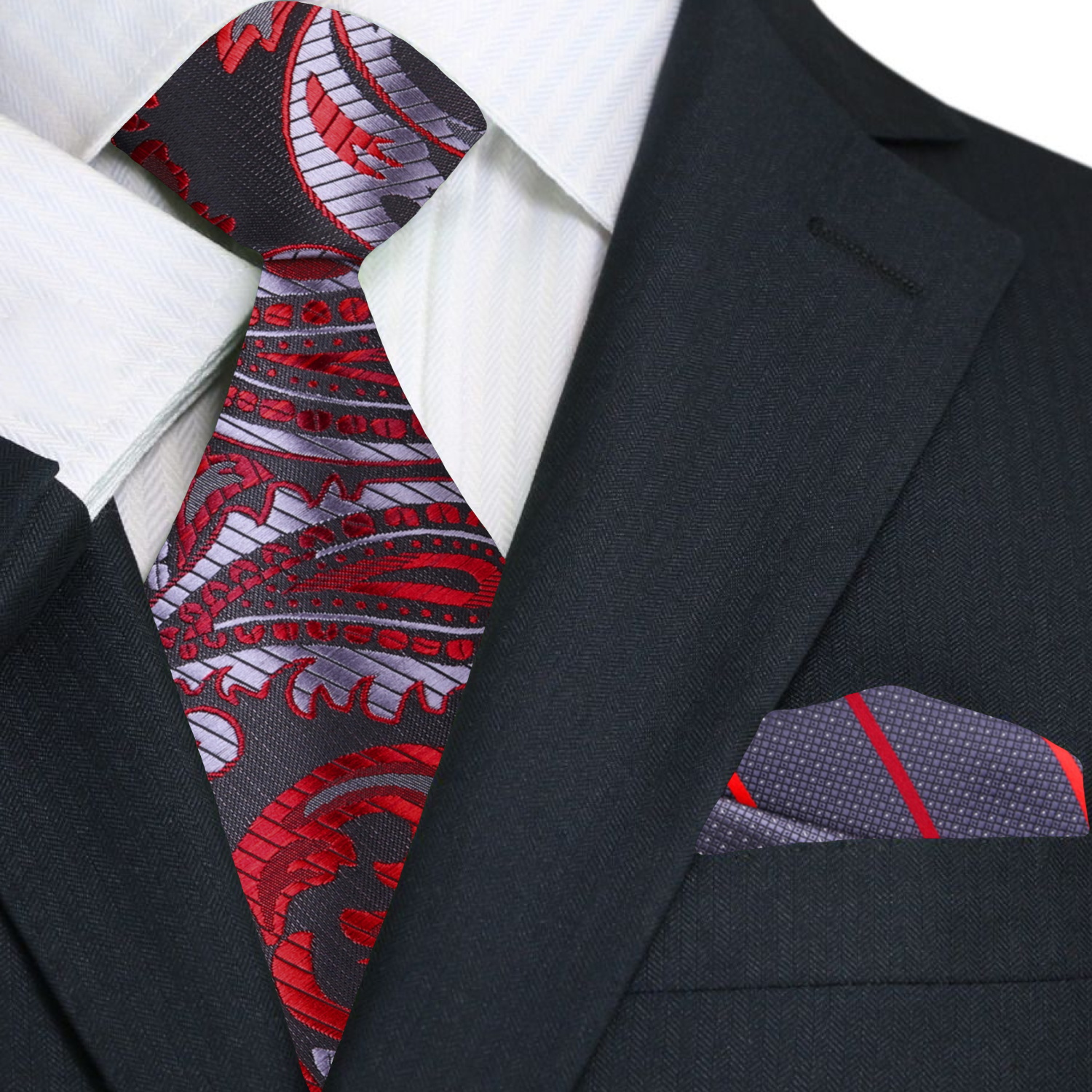Black suit with a red and gray patterned tie and matching pocket square.