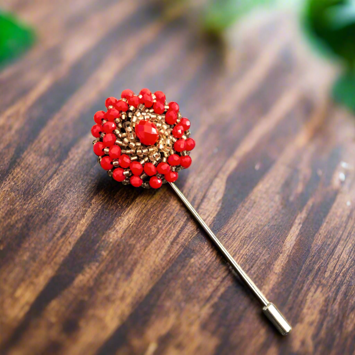 A red lapel pin view 2