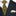 Orange, Red and Yellow Abstract Tie worn with a black suit and white shirt.