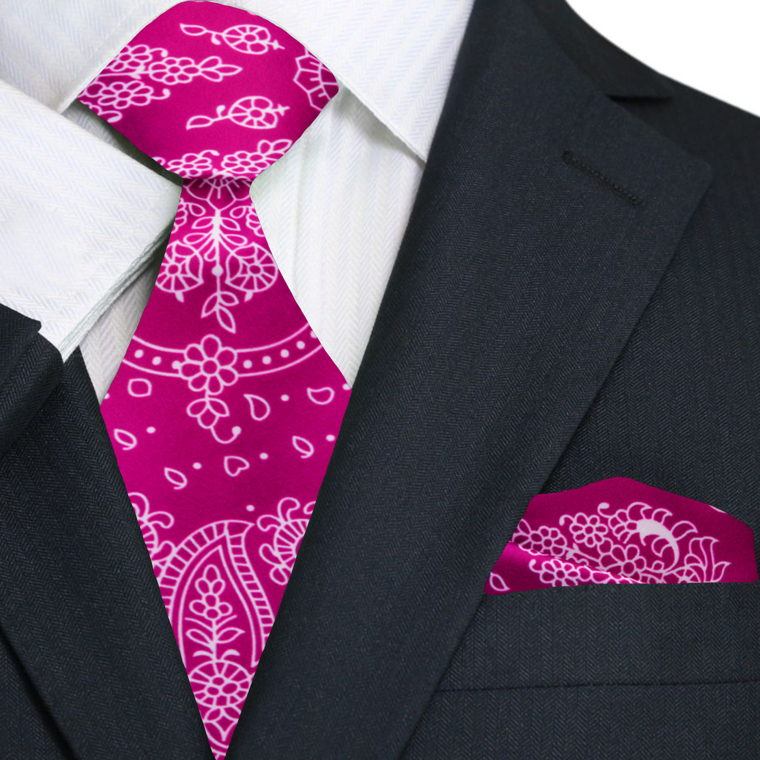 Black suit with a pink paisley tie and matching pocket square
