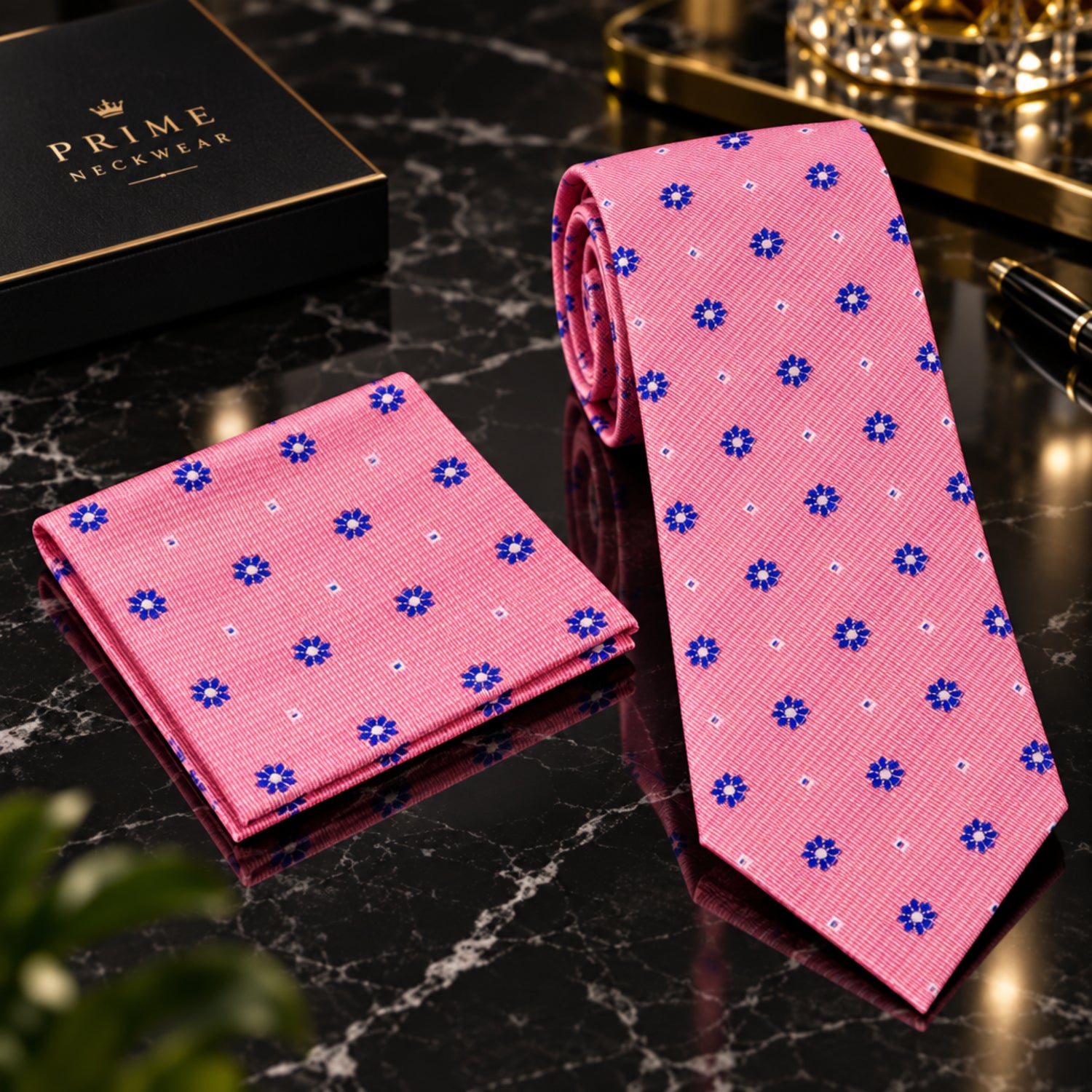 Black tie with red polka dots on a marble surface