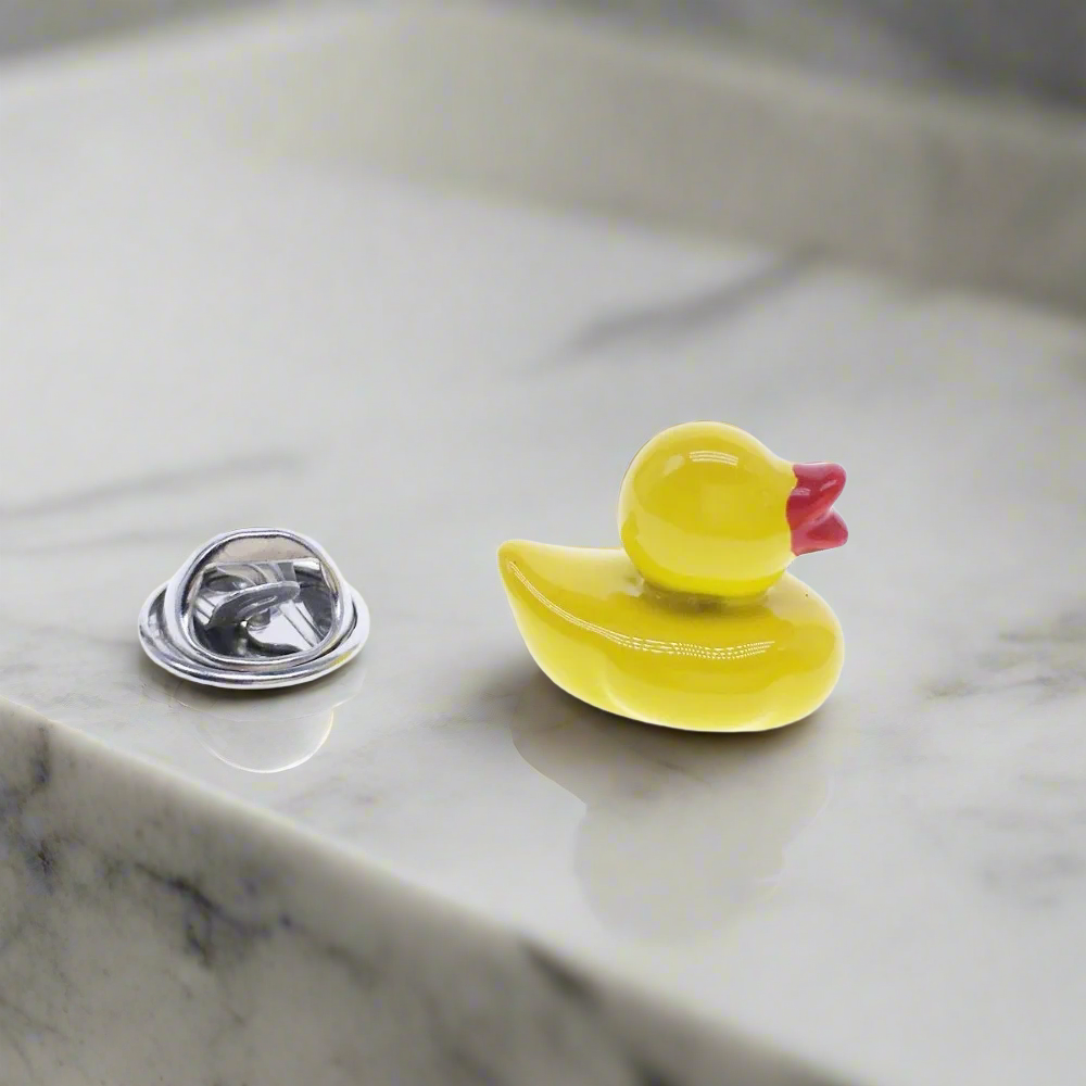 A yellow rubber ducky lapel pin