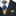 Black suit with a blue and yellow patterned tie and pocket square.