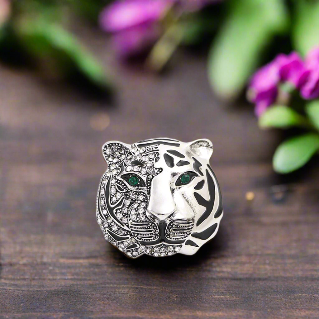 a silver colored lapel pin
