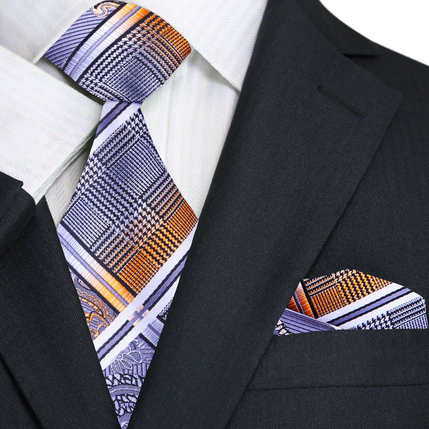 Black suit jacket with a silver and orange paisley patterned tie and matching pocket square.