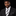 Man wearing black white stripe tie and accenting square