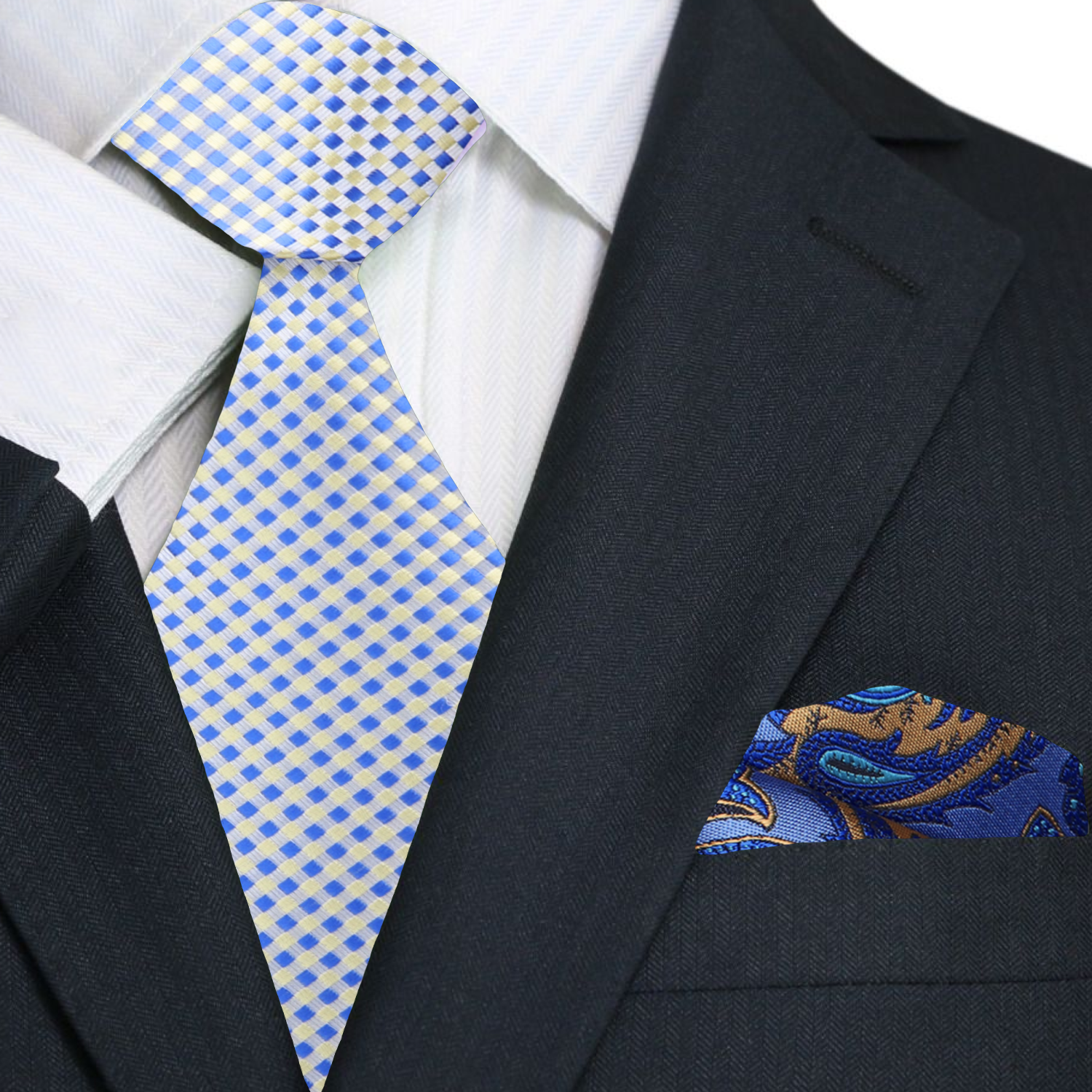 Navy suit with a blue and yellow checkered tie and a patterned pocket square.
