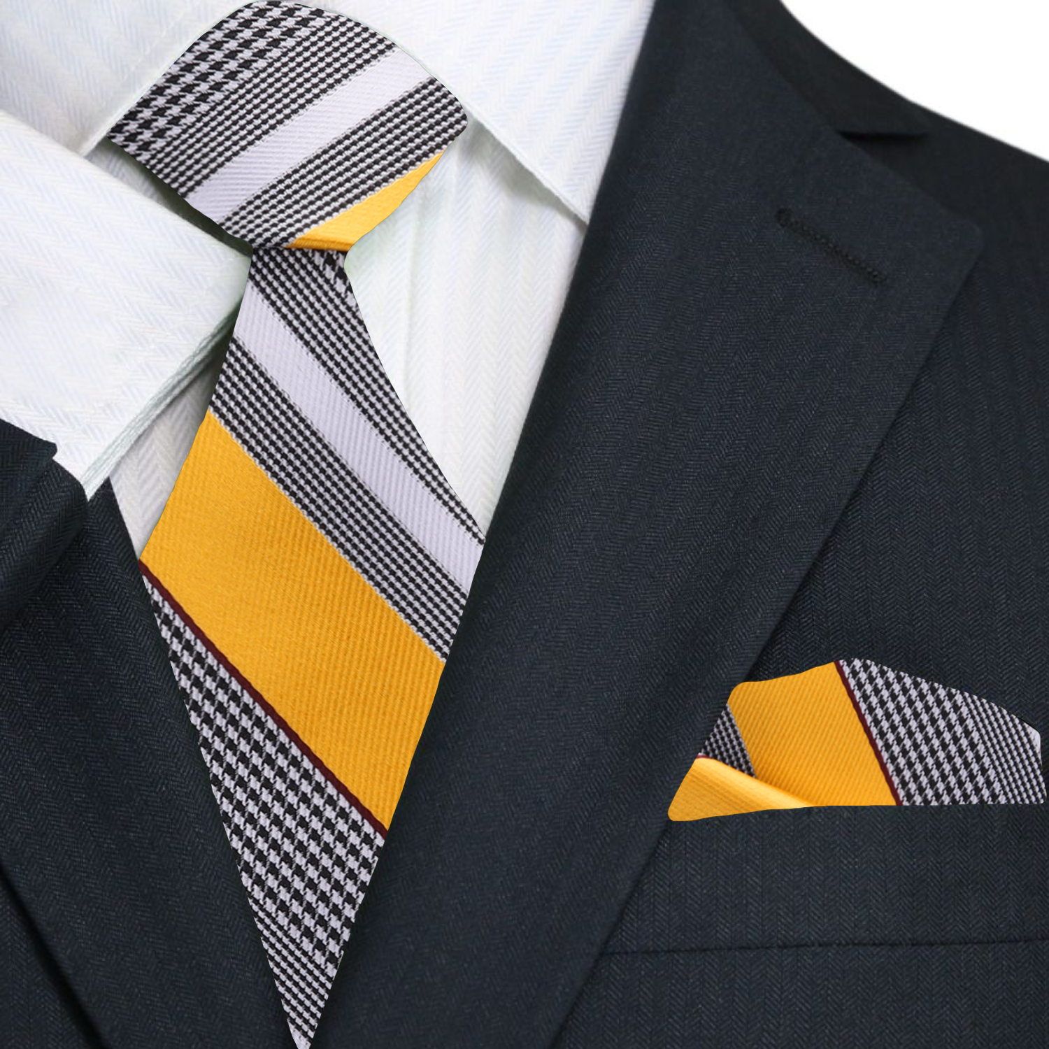 Black suit with a yellow and gray striped tie and matching pocket square.