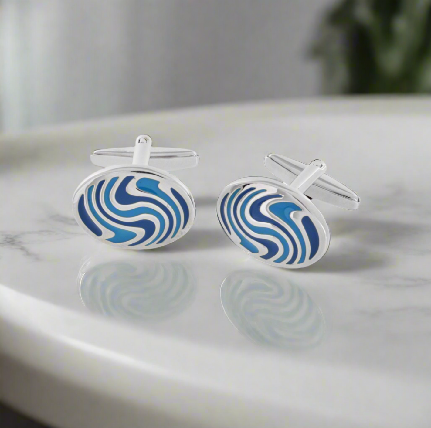 chrome and blue oval cufflinks