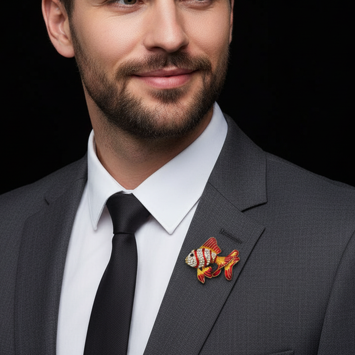 Man wearing a gray suit with a colorful fish brooch on a black background