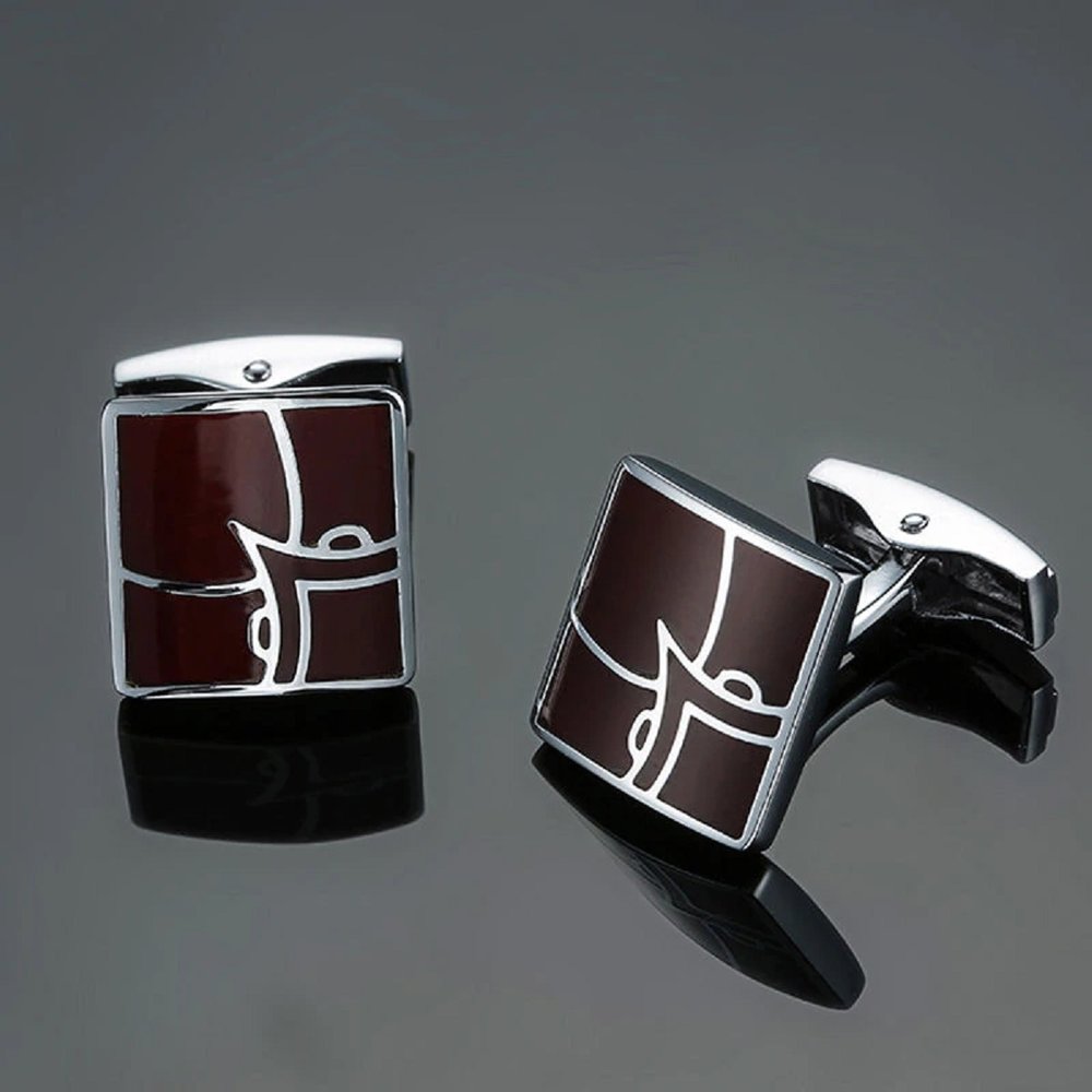 A Chrome and Mahogany Color and V Shaped Cuff-links