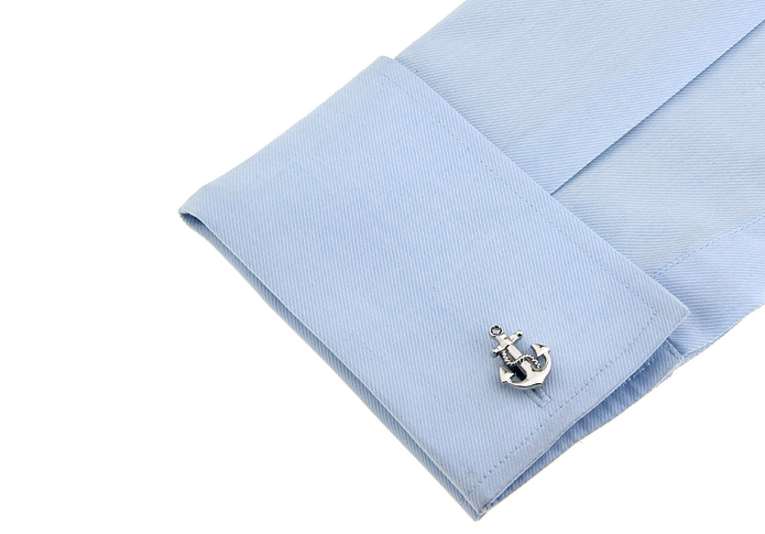 On Sleeve: A chrome colored boat anchor shaped cuff-link