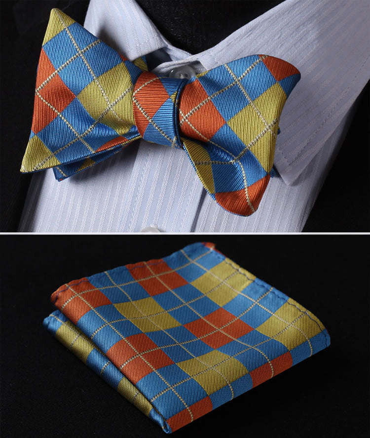 A Yellow, Blue, Orange Geometric Argyle Pattern Silk Self Tie Bow Tie, Matching Pocket Square and Cuff-links.||Yellow, Light Blue, Orange