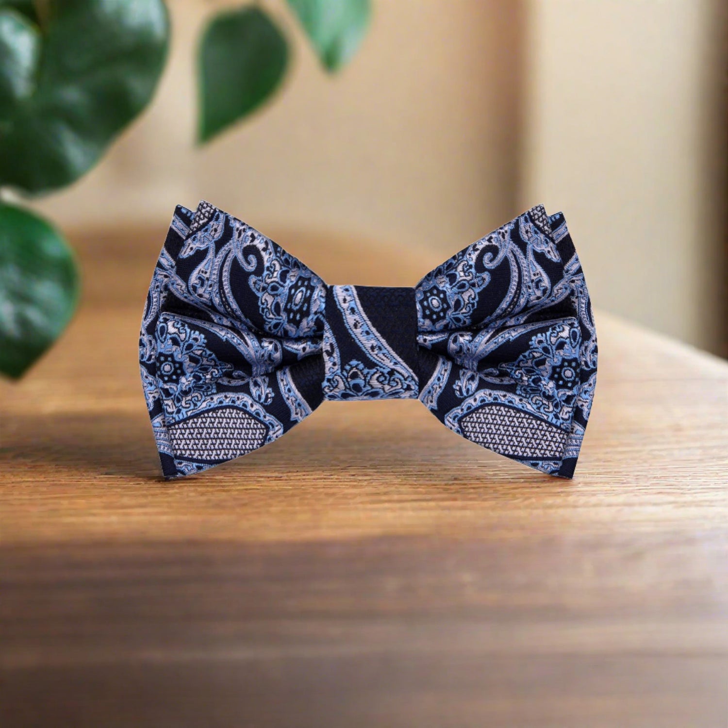 A Dark Blue, Ice Blue Detailed Paisley Pattern Silk Self Tie Bow Tie 
