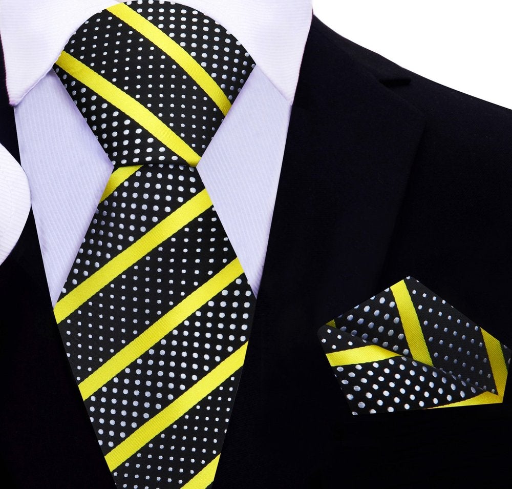 A Black Silk Background With Yellow Stripes And White Dots Necktie With Matching Pocket Square