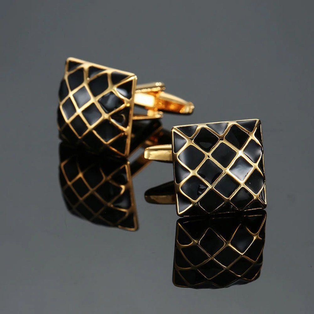 A Gold, Black Colored Geometric Diamond Pattern Cuff-links.