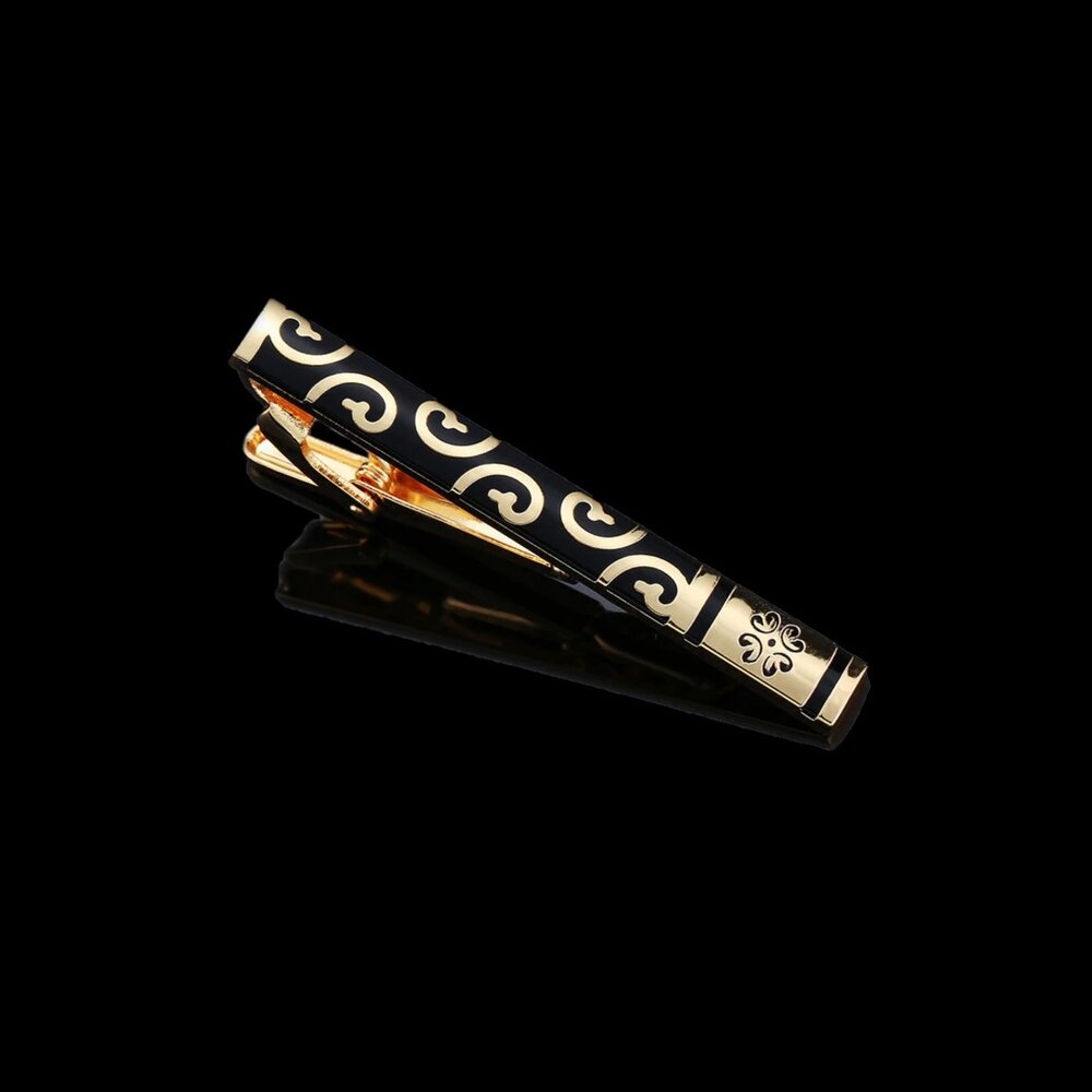 A Gold with Black Colored Intricate Vine Pattern Tie Bar