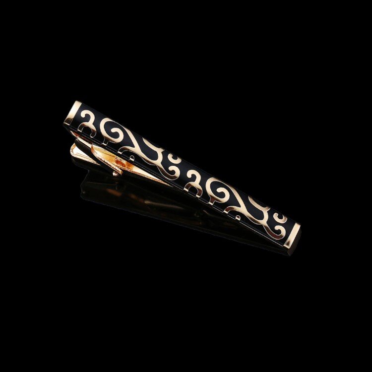 A Black with Gold Floral Pattern Tie Bar