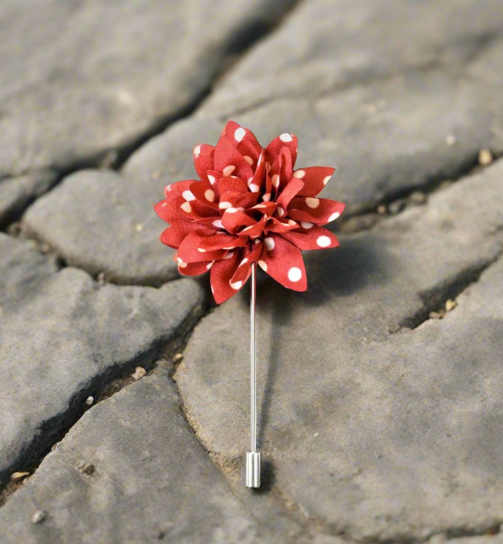 A Crimson, White Polka Dot Lapel Flower||Crimson, White
