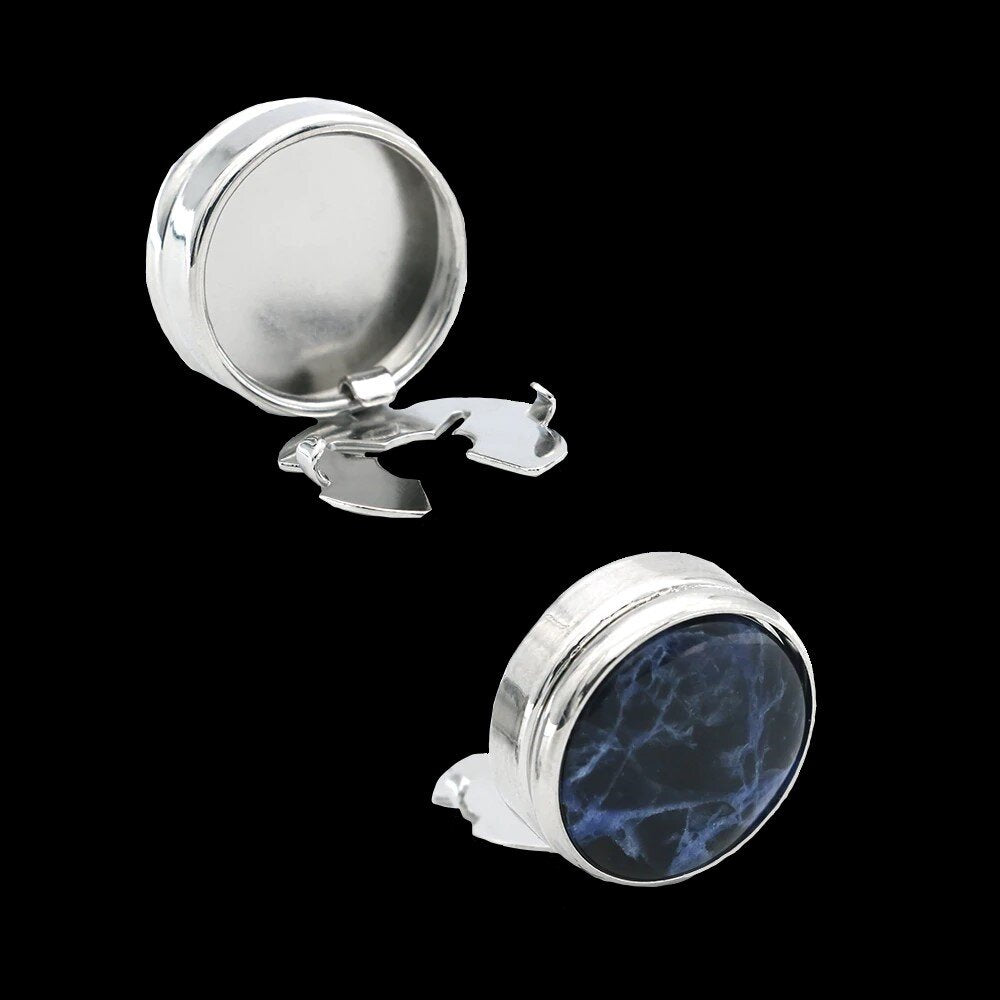 View 2: A Chrome colored button cover with blue black marble design