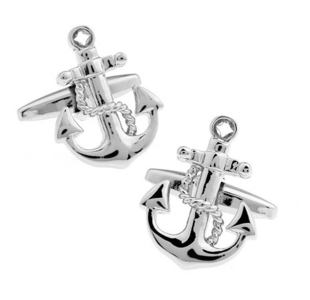 A chrome colored boat anchor shaped cuff-links
