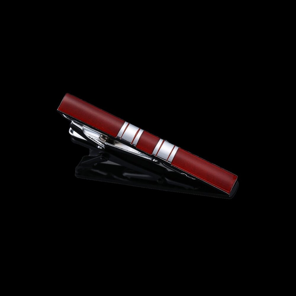 A Chrome with Mahogany Colored Geometric Pattern Tie Bar