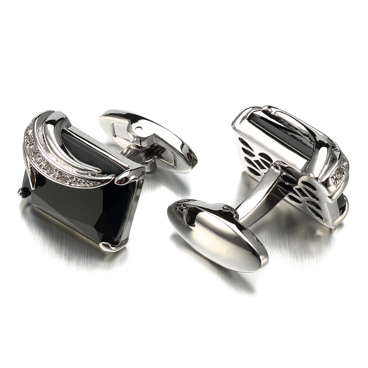 A Silver Colored with Black Gemstones Cuff-links
