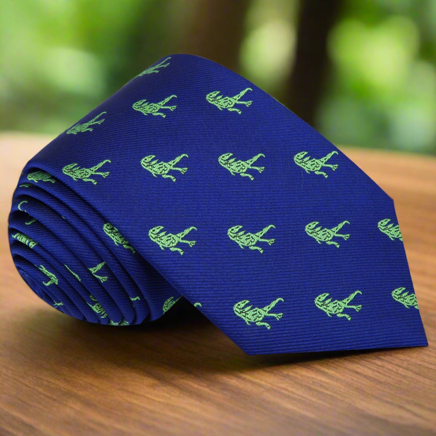 a blue with green t rex necktie