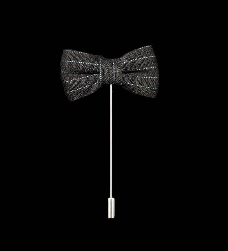 A Black, White Pinstripe Colored Bow Tie Shaped Lapel Pin||Dark Grey with White Pinstripe