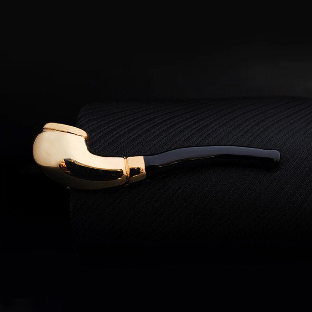 A Gold, Black Colored Pipe Shape Tie Bar