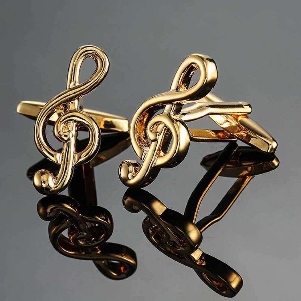 A Gold Colored Music Note Shape Cuff-links Set.