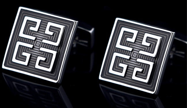 View 2: A Black, Chrome Colored Square Shape With Intricate Design Cuff-links.