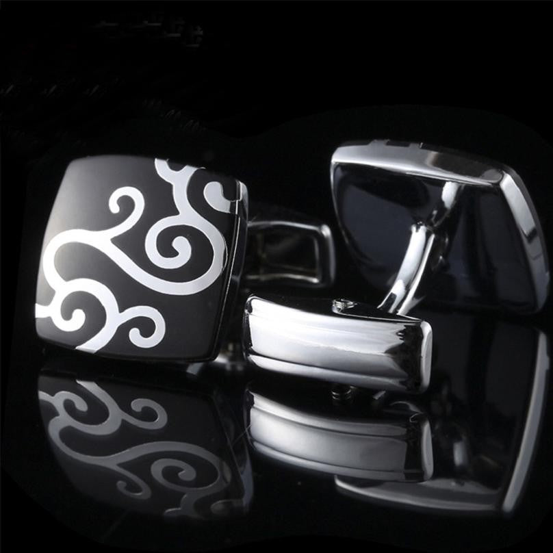 A Black, Chrome Colored Square Shaped With Vine Pattern Cuff-links.