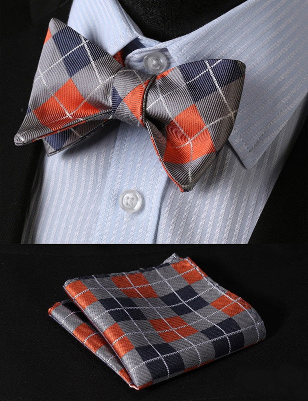 A Grey, Orange, Blue Geometric Argyle Pattern Silk Self Tie Bow Tie, Matching Pocket Square and Cuff-links.||Orange, Grey, Dark Blue