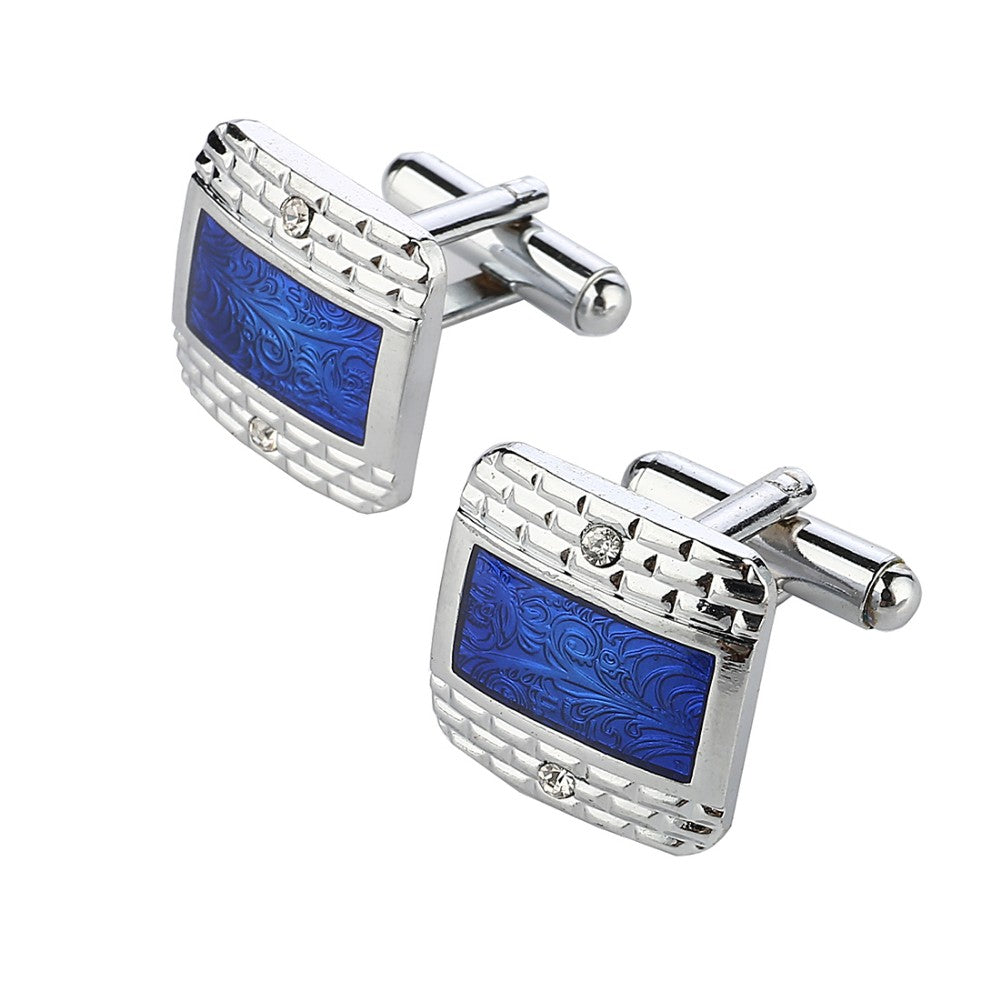View 3: A chrome and blue colored rectangle shaped with checkerboard and waves detail pair of cuff-links