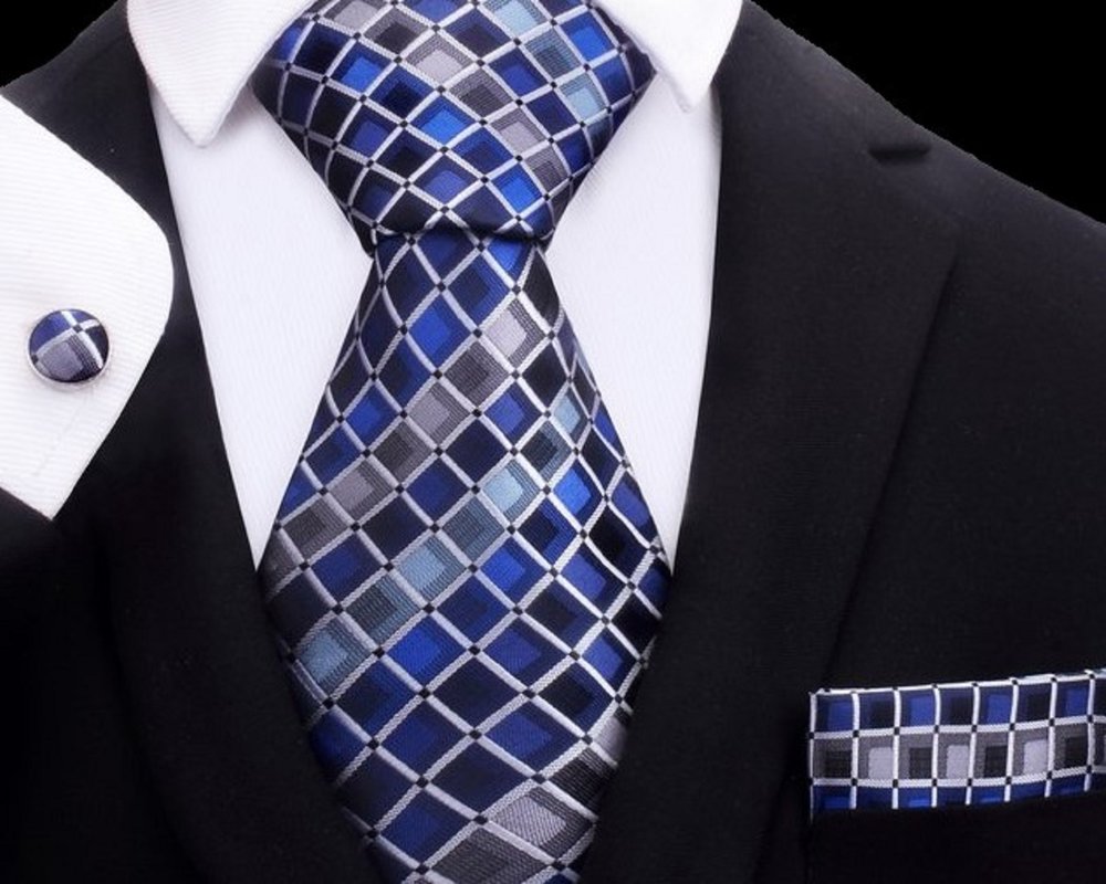 A Grey, Black, Blue Geometric Diamond Pattern Silk Necktie, Matching Pocket Square And Cuff-links.||Blue, Grey, Black
