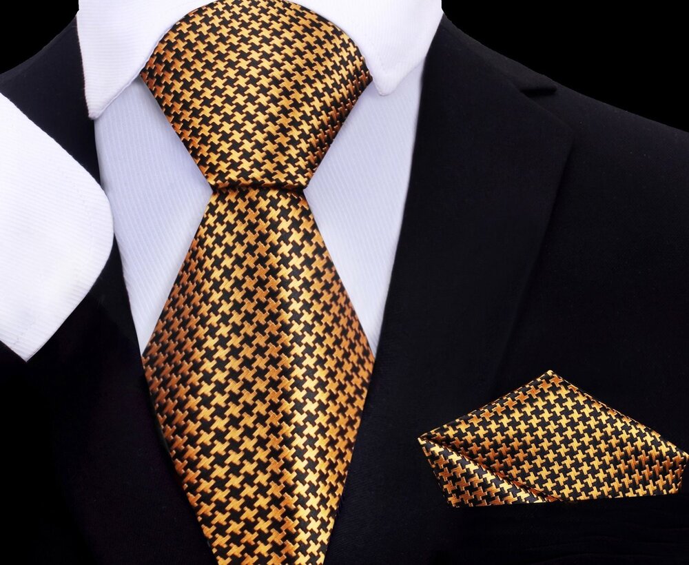 A Gold And Black Houndstooth Pattern Silk Necktie With Matching Pocket Square