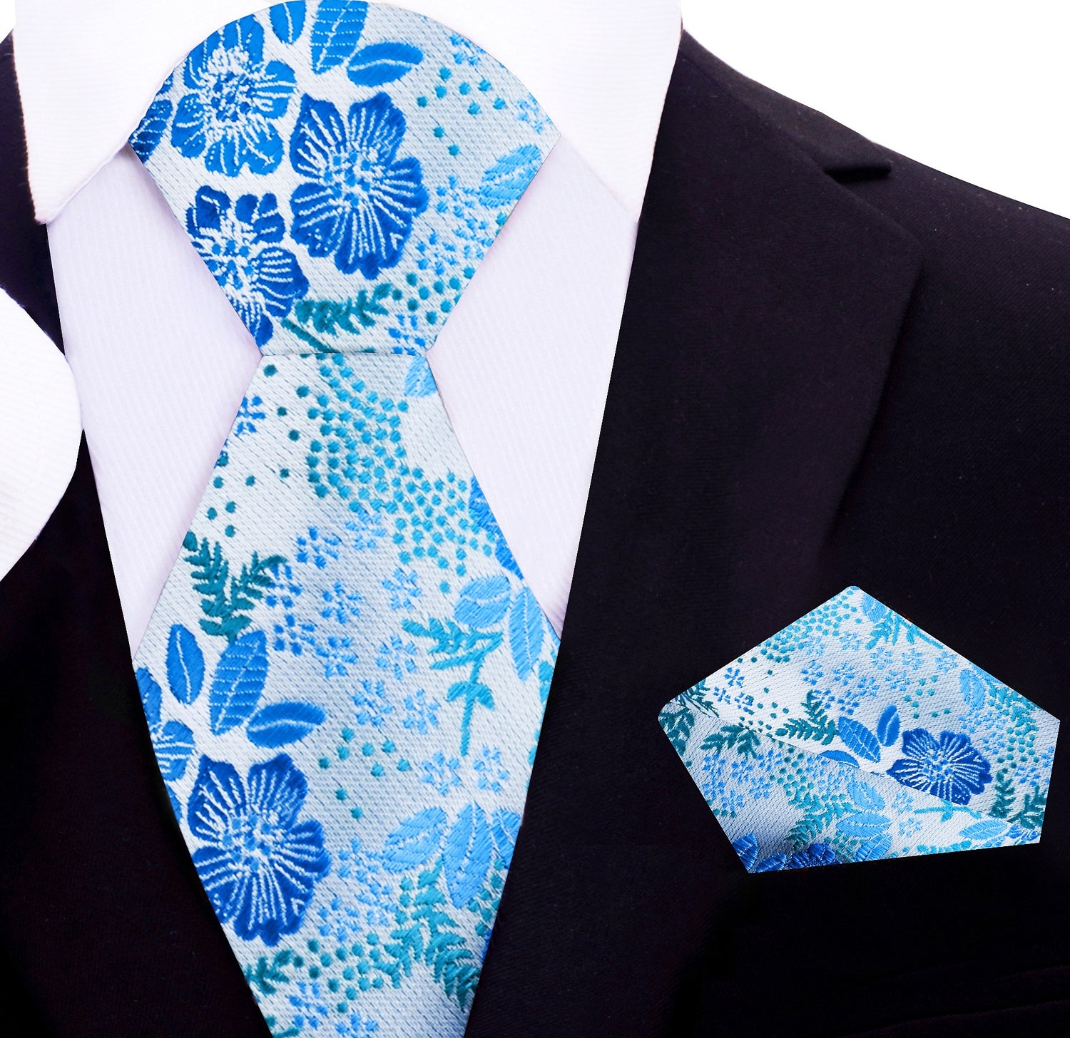 A Light Blue, Green, Blue Floral Pattern Necktie With Matching Pocket Square 